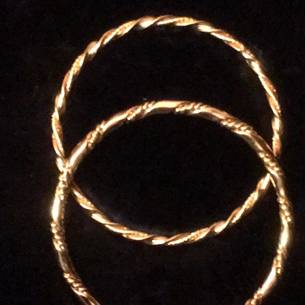 2 Heavy Gold Tone Bangles.
